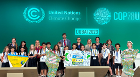 Kindermeilen-Übergabe auf der COP28