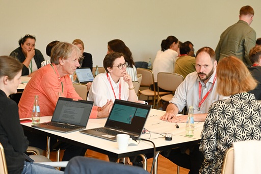 People discussing at table